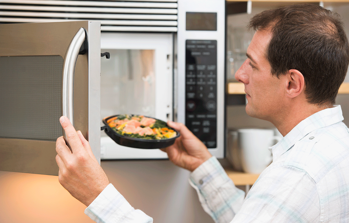 Man microwaving food