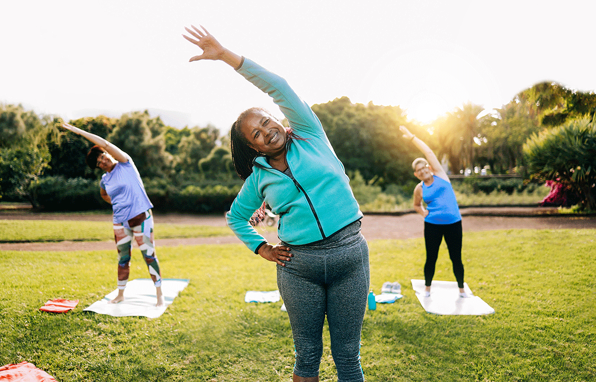 Women participating in outdoor yoga