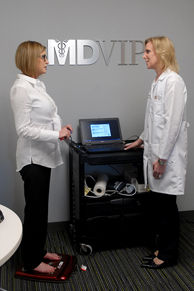 Doctor speaking with her patient about weight loss