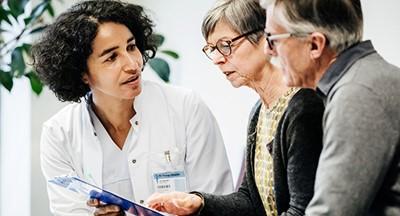 Older couple consulting with physician