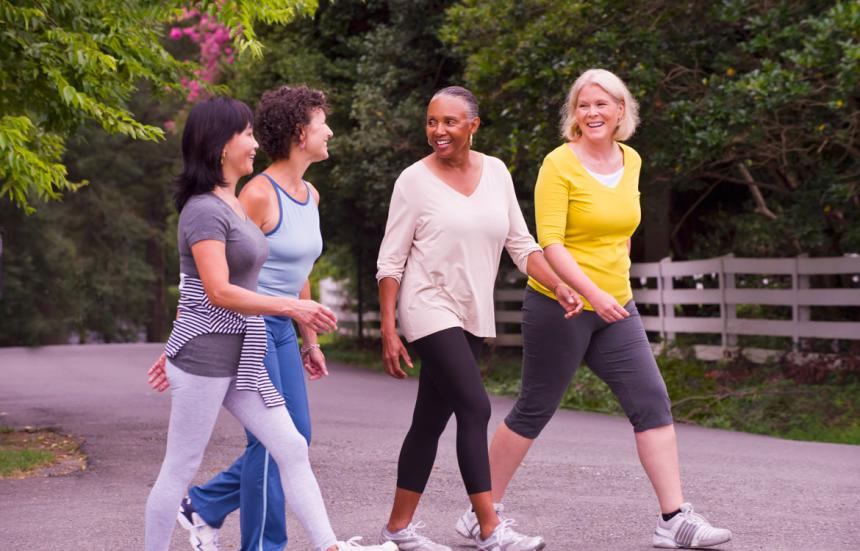 a group of women walking outside