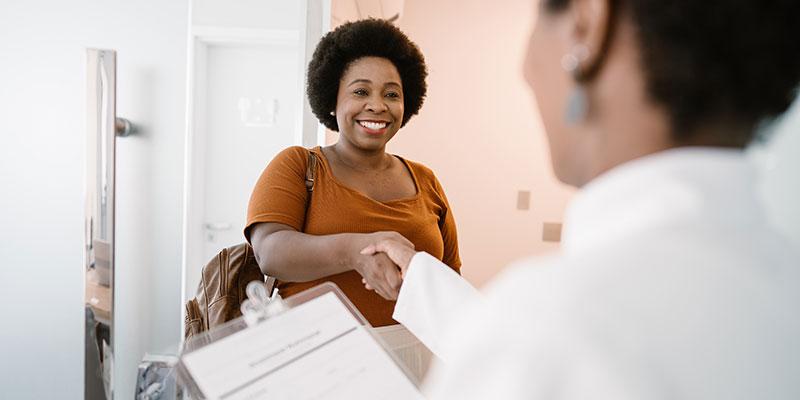 doctor speaking to patient