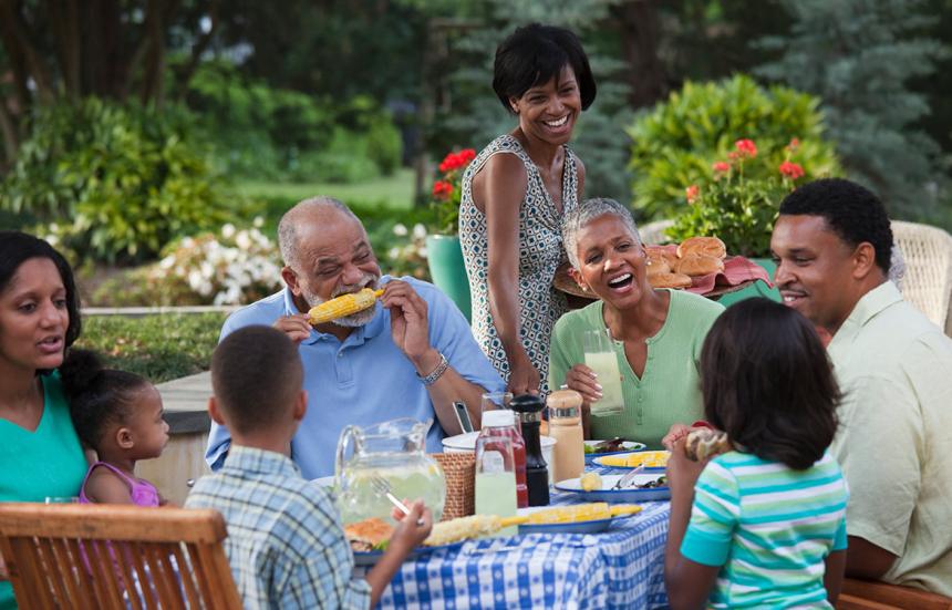 family enjoying meal at a table