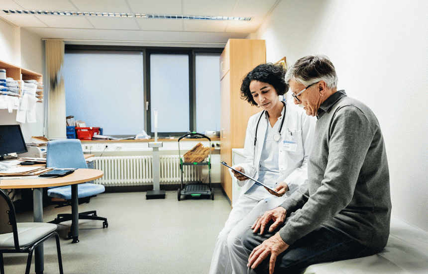 man working with female physician