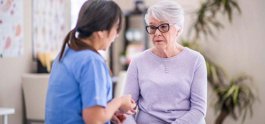 primary care doctor talking to mental health patient