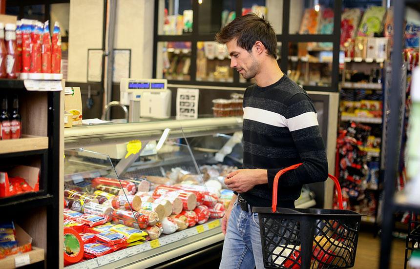 Shopping for processed meat in supermarket