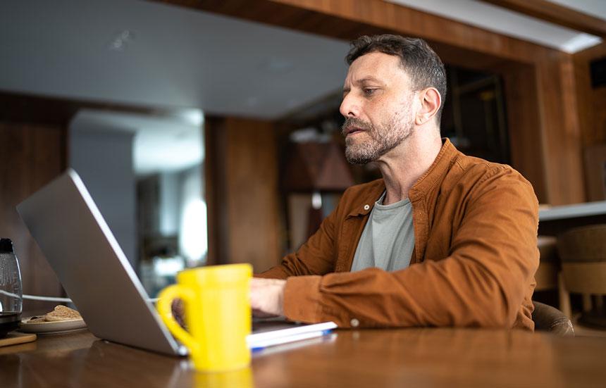 Man working at standing workstation