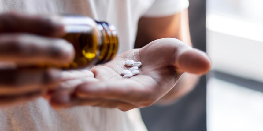 A woman taking supplements