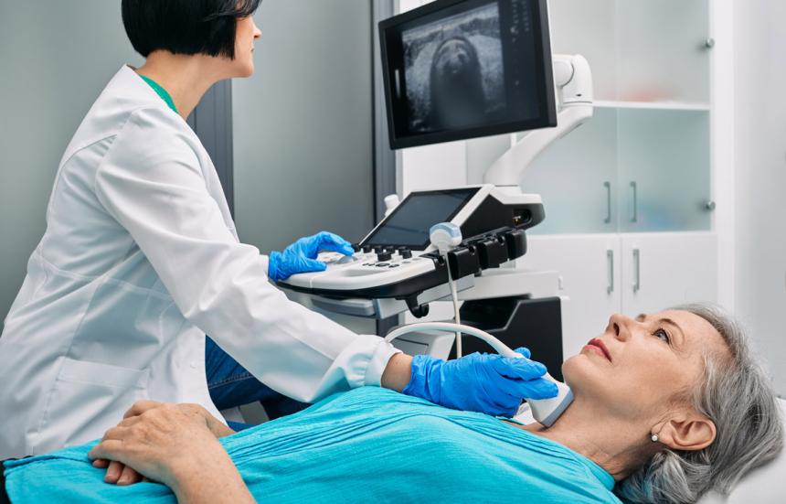 doctor performing medical exam on patient