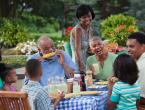 family enjoying meal at a table