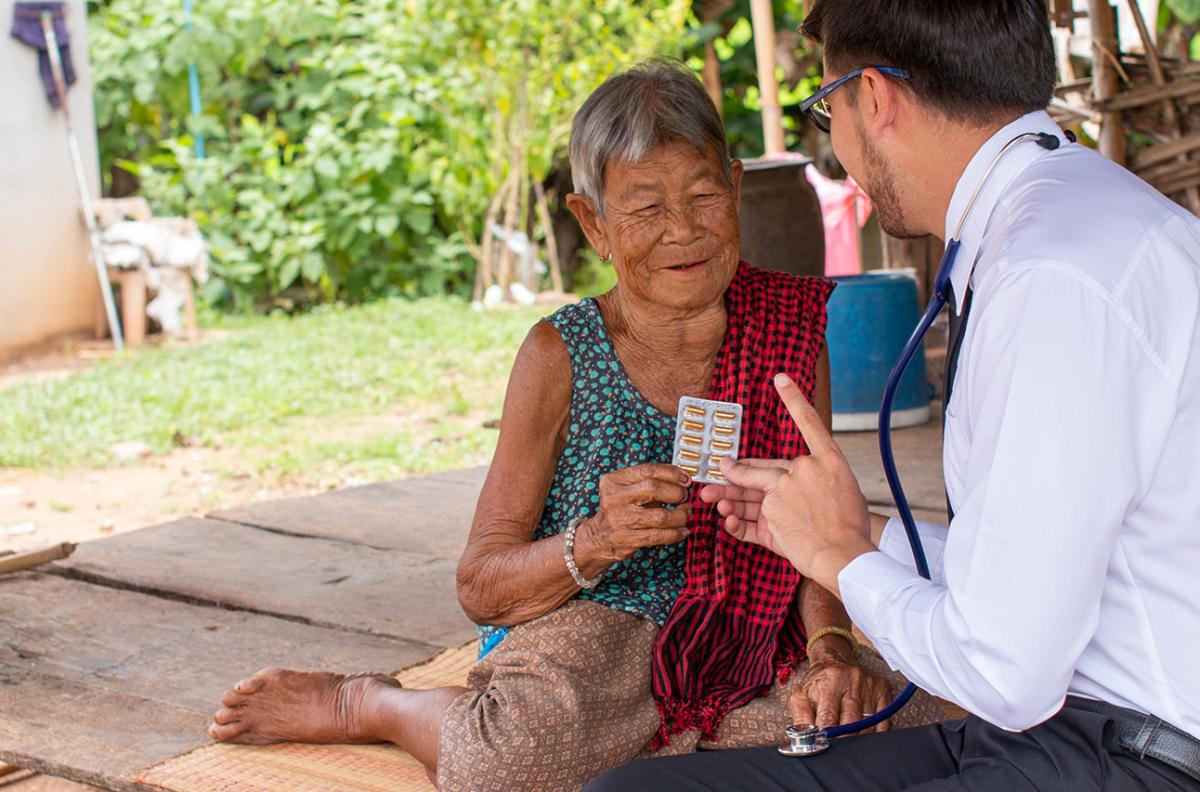 Physician treats patient in third-world country.